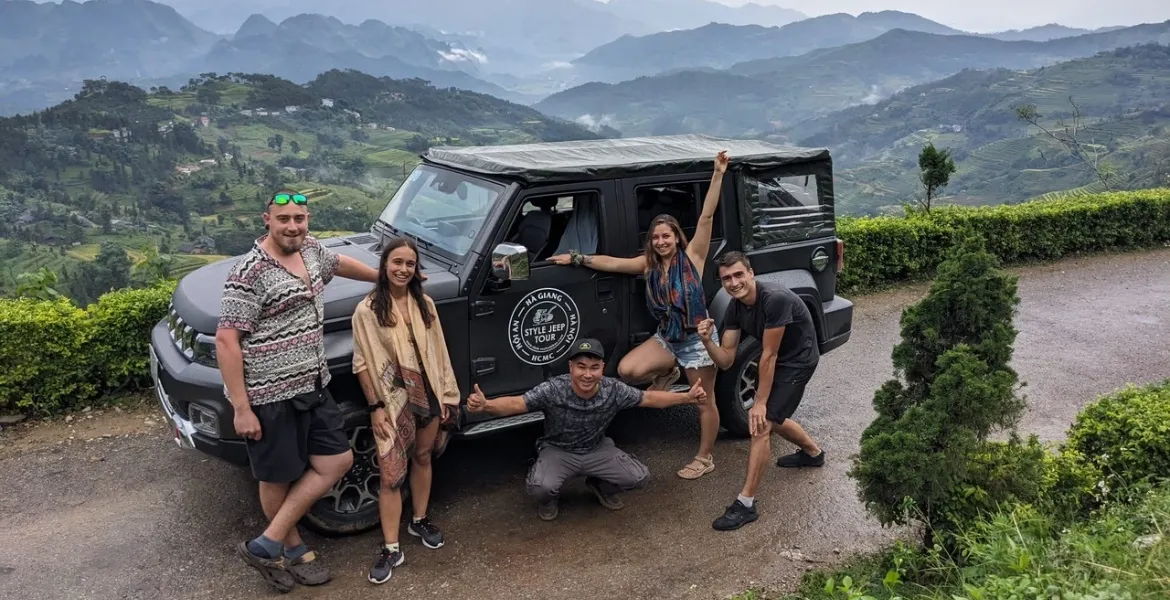 Ha Giang car rental with driver provider assisting tourists on the road
